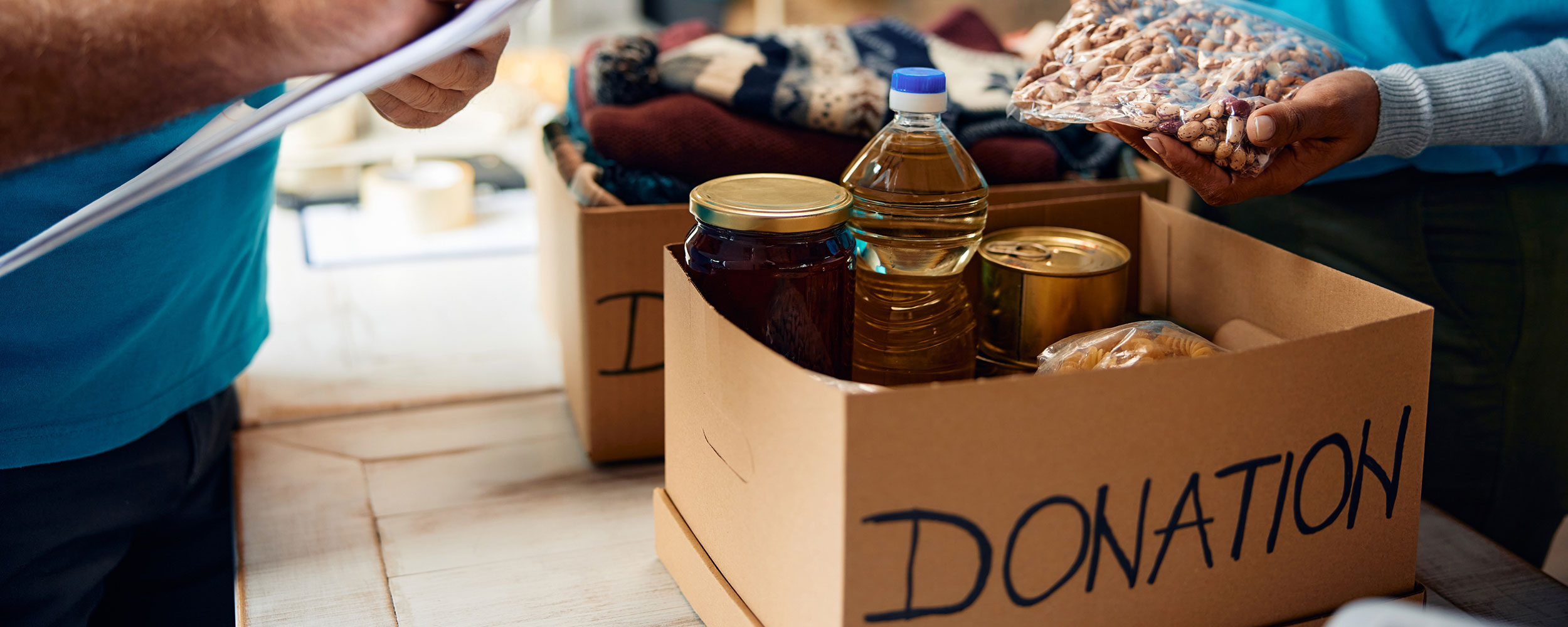 Food donations in a box labeled "donations".