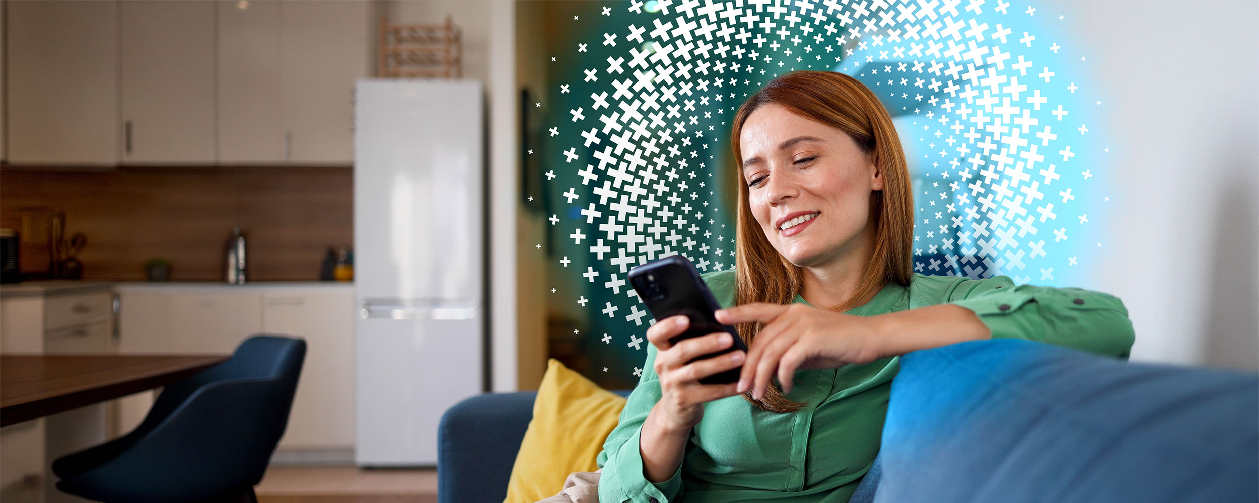 Woman looking at her phone with glee.