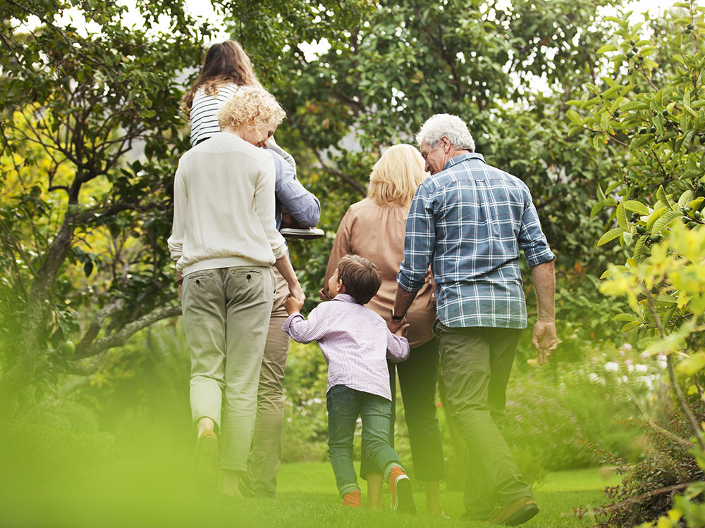 750-history-184316094 Grandparents take a walk with kids.